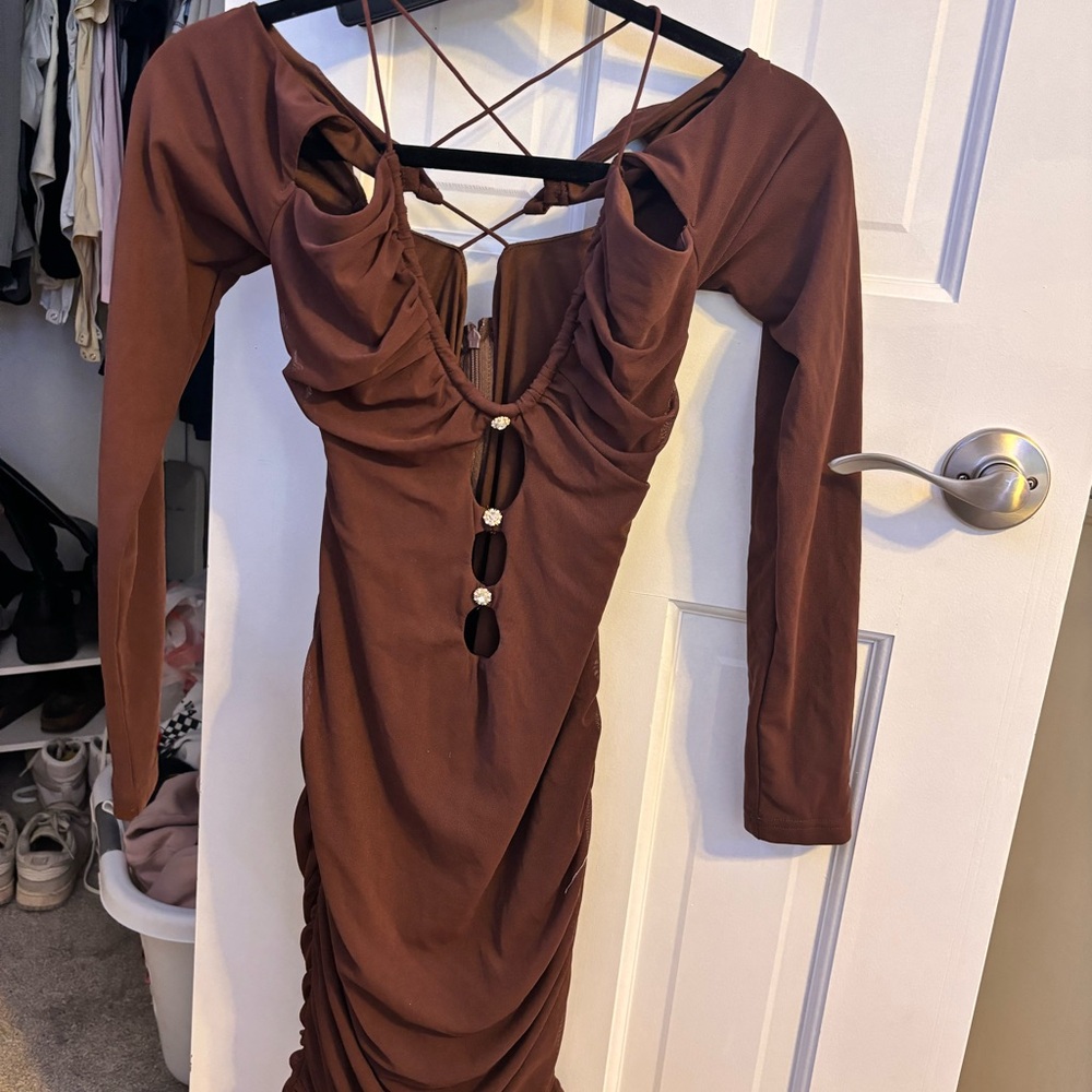 Going out dress. Brown, with gems and a criss crossed back.